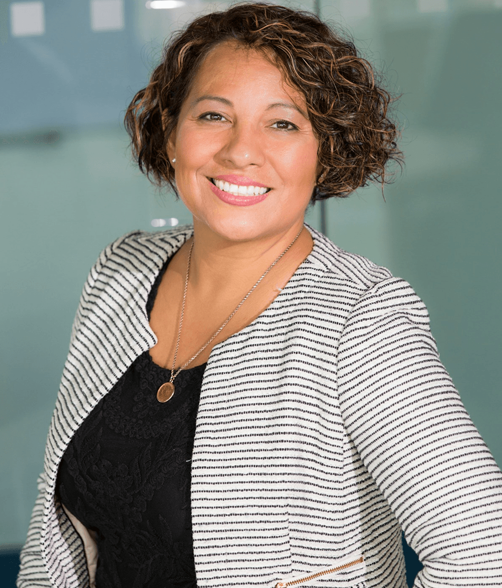 Professional working at desk with art supplies